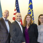 Dean Gary Henry, Laura Desimone, and Chrystalla Mouza posing with Mangone Scholar award winner Joshua Wilson