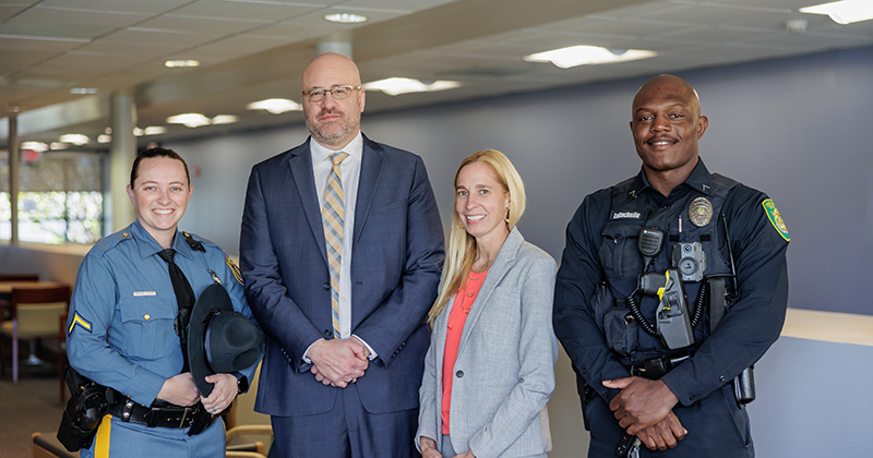 Charles Sawchenko and Alisha Fletcher of the Delaware Network for Excellence in Autism, housed in the College of Education and Human Development’s Center for Disabilities Studies, with two first responders who participated in recent training.