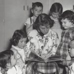 A UD student teacher reads to a group of children at CEHD’s Lab School in the 1950s.